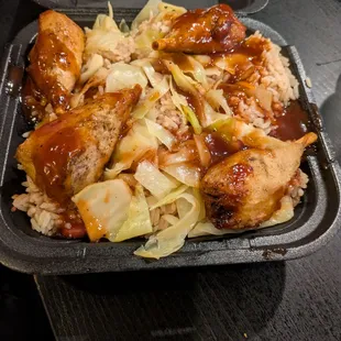 Vegan chicken, rice and peas, and cabbage