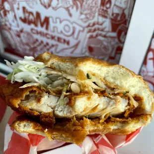 Sando after a few bites. This chicken was named Dolly &apos;cause it was a huge breast.