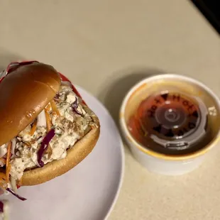 6th Man  bell &amp; evans chopped breast, buttermilk ranch, slaw, buttered bun / served with hot dip to dunk