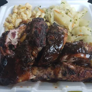 Jerk chicken, cabbage, mac n cheese. Mix the mac with the jerk sauce, it&apos;s excellent! Chicken was amazing, cabbage nicely seasoned.