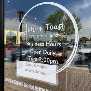 a sign in the window of a business