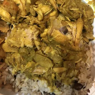 chicken curry and rice in a styrofoam container