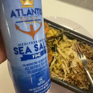 Me adding salt to my meal