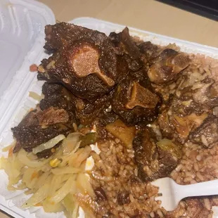Highly upset. This food is dry and the oxtail is fatty and tough. Basically paid $25 for rice. It's a smidge of cabbage and