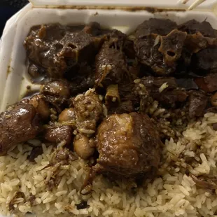 Oxtail and rice and peas