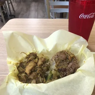 a pulled pork sandwich and a coke