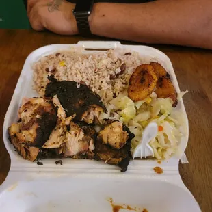 Jerk chicken with rice and peas, cabbage,plantains