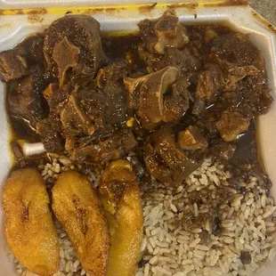 Stew Ox-Tail Dinner and Jerk Chicken on the side