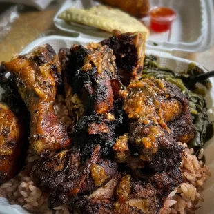 Jerk Chicken, Rice and Peas, Spinach, Patties, Oxtail Egg Rolls