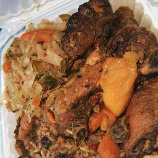 Cabbage + Rice and Peas + Jerk Chicken + greens