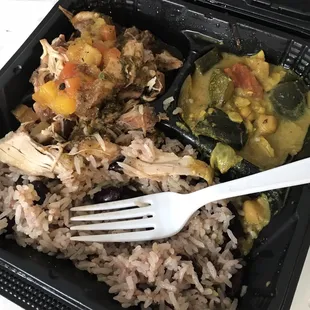 Jerk chicken, heavenly rice and beans, and curried vegetables. Amazing. Every bite.