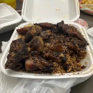 a meal in a styrofoam container