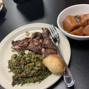 Jerk chicken quarter, spinach, yams