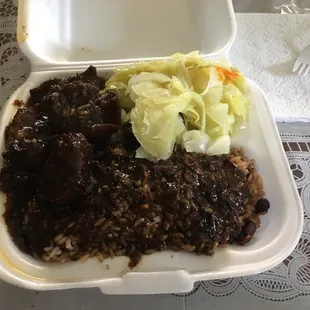 a meal in a styrofoam container