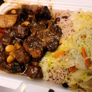 Lots of rice again meat was tender bones on bottom mainly.