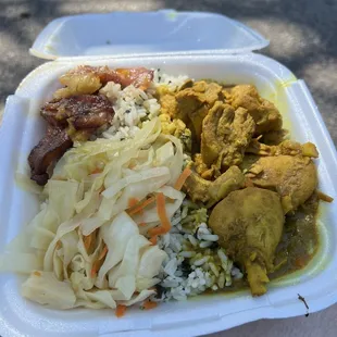 Chicken curry with vegetable rice, and fried plantains.