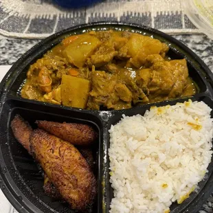 Curry Chicken, white rice and Fried Plantain
