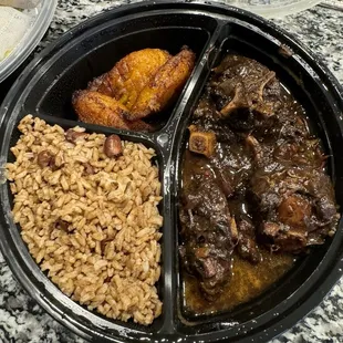 Oxtail, rice and peas and Fried Plantain