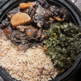 Oxtails with rice and greens (absolutely delicious)
