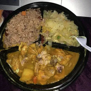 Curry Chicken , Steamed Cabbage &amp; Stew Peas and Rice. Absolutely delicious !!!!! 10/10