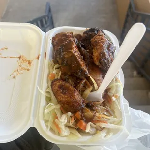 Amazing jerk chicken with oxtail and pepper sauce authentic flavor great spice cooks are nice enjoy