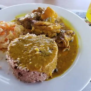 Curry chicken, rice and peas, cabbage