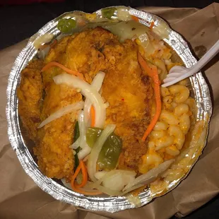 Fried Tilapia dinner plate with Macaroni Pie and Veggies.