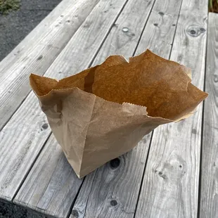 The bag. Can't put it on my car seat since it's oily. Stopped by my office on this beautiful Sunday evening and just ate them outdoors.