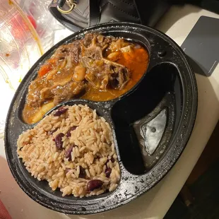 Oxtail and Rice and Peas I got fries as my second side.