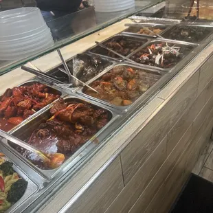 a buffet with a variety of food items