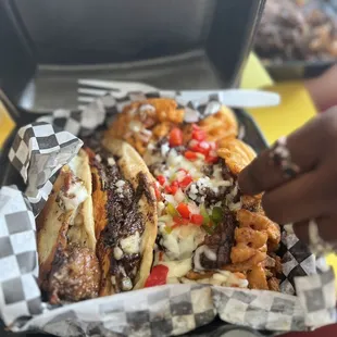 Oxtail tacos with oxtail fries