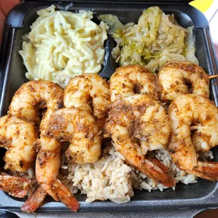 Jerk shrimp, caribbean mac and cheese, cabbage were delicious