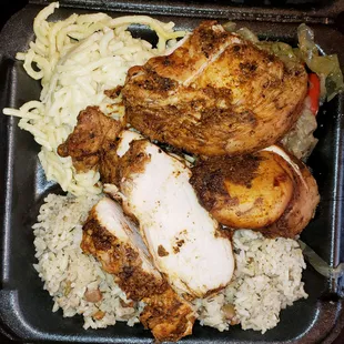 Jerk Breast with Caribbean mac, steamed cabbage, and rice &amp; peas