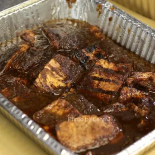 Jerk Tofu ($60 for half pan) - Firm tofu marinated in Jerk seasonings, then grilled to perfection