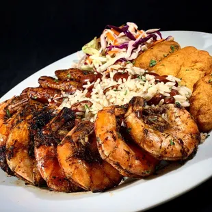 Jerk shrimp rice n peas festival fried plantains and sour slaw