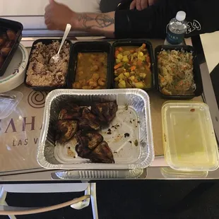 Coconut shrimp,jerk chicken ,cabbage , rice etc