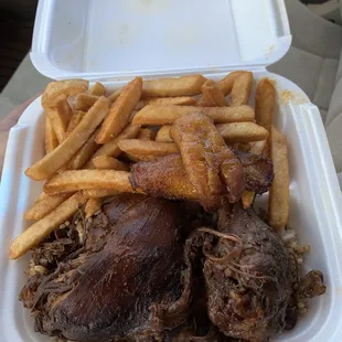 a meal in a styrofoam container