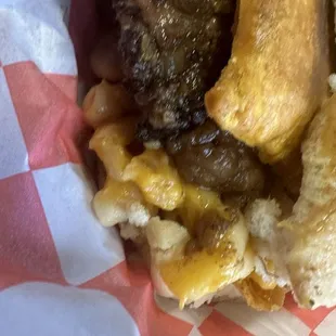 a sandwich with meat and cheese