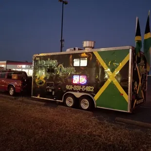a jamaican flag on the side of the truck