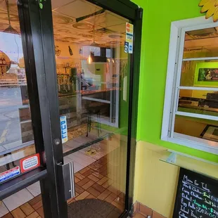 The inside door is locked. Order at the window.