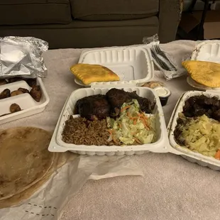 Fried Plantains, Beef Patty, Jerk Chicken, Oxtail, Rice and Peas