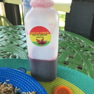 It's a native drink called Sorrel I think, very nice. It reminded me of the Peruvian drink called Chicha Morada! A must!!!