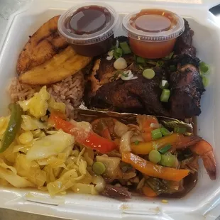 a styrofoam container of food