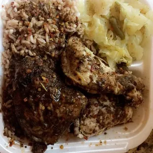Medium Jerk Chicken with extra spice, cabbage, rice and peas.