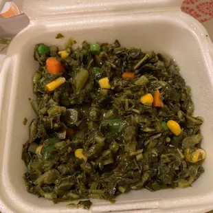 Jamaican greens are not good. Frozen or canned greens and mixed vegetables. No flavor