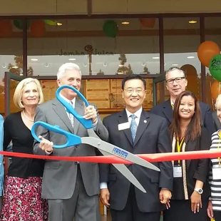 Robert gives check to UCI Soccer teama