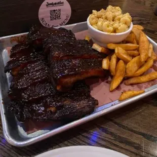 The famous in house smoked ribs, fall off the bone tender and delicious, on special on Thursday for 23 bucks with 2 sides!