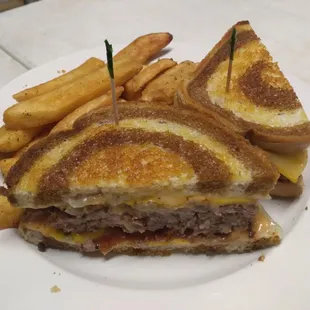 boozie melt 2 different kinds of cheese, grilled onions mushrooms and a 1/2 lb patty on marble rye. So good!