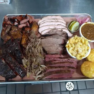 Grand slam, its all of the delicious smoked meats on one plate with 2 sides and corn bread, great for sharing!