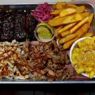 Triple play combo, your choice of 3 meats and 2 sides with cornbread!